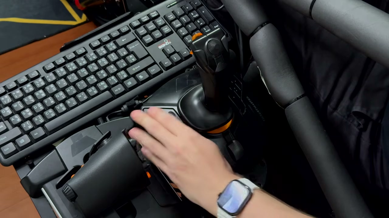 The buttons arranged around the base of a Thrustmaster T.16000M
